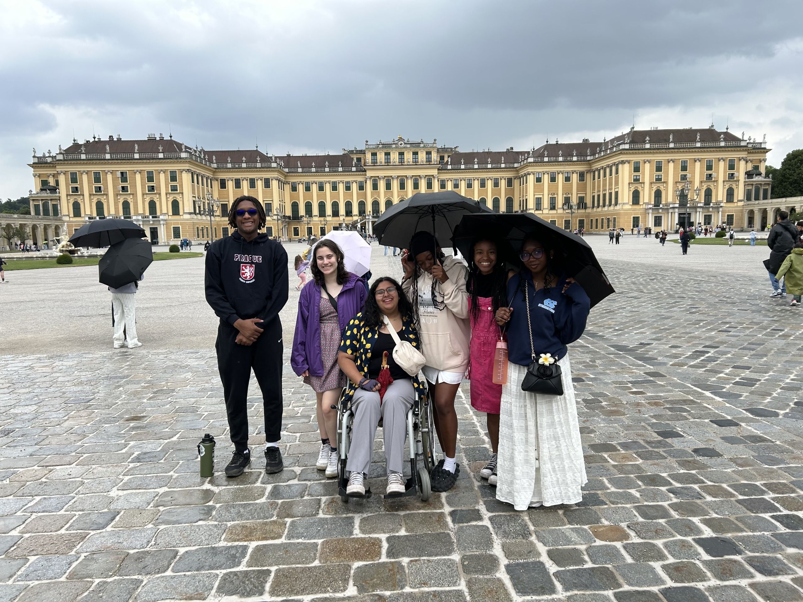 Group of students in front of European building.